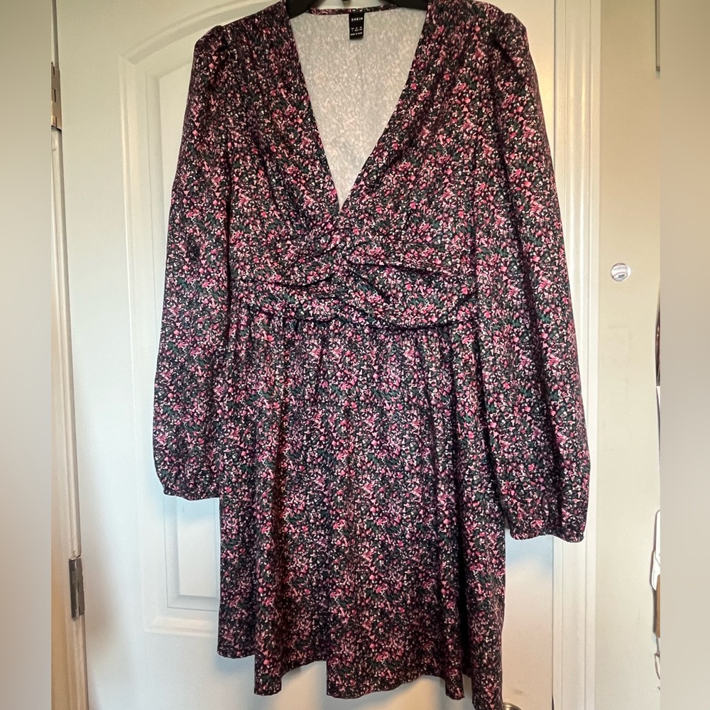 Long sleeve, flowy fun floral dress.
